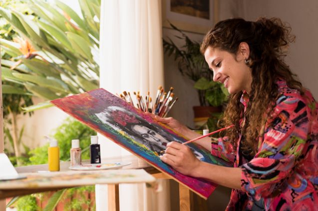 girl painting canvas